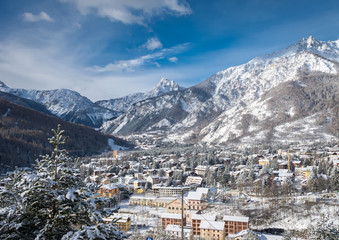 Beautiful scenic view of Bardonecchia, Piedmont, Italy, Italian Alps, covered in fresh snow after a snowfall against a crystal clear blue sky, snowy slopes, winter landscape. Photos with Snow