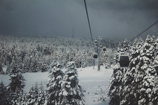 Cable car view in the snowy forest of mountain Uludag