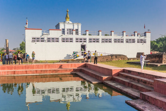 Mayadevi temple with reflection in the pond in Lumbini, Nepal