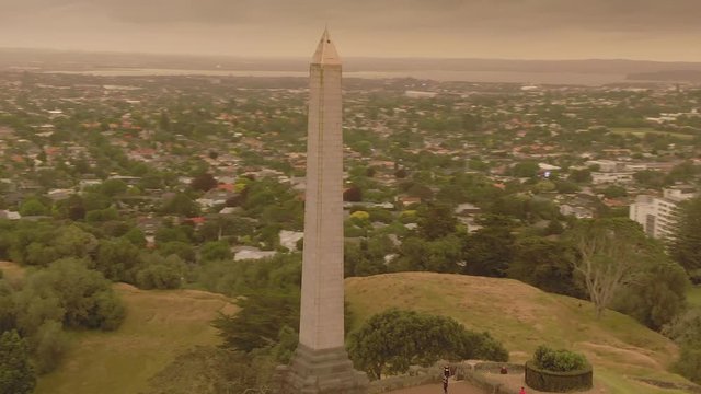 Aerial: One Tree Hill and orange skies created from the Australian bush fires that swept accross the Tasman Sea.  Auckland, New Zealand.  5 January 2019