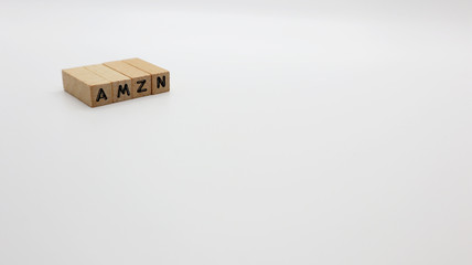 TOKYO, JAPAN. 2020 Jan 5th. Wooden Text Block of AMZN on Isolated Background