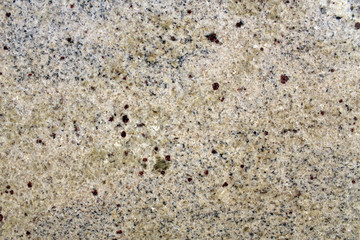 White marble rock texture with dark red minerals
