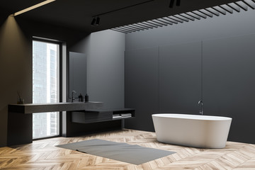 Gray bathroom corner with but and sink