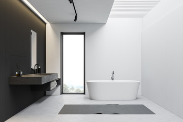 Obraz na płótnie Canvas White and gray loft bathroom with tub and sink