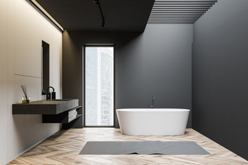 Fototapeta na wymiar Gray and white loft bathroom with tub and sink