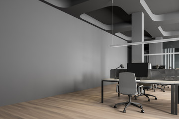 Workplace in modern gray open space office