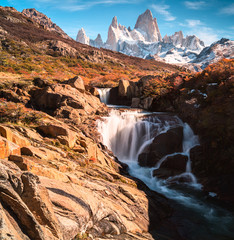 Mount Fitz Roy and the waterfall  in the Los Glaciares national park. Autumn in Argentina,...