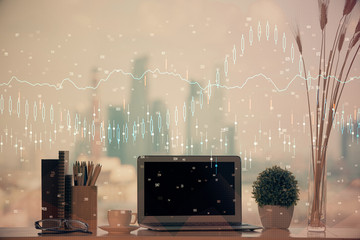 Double exposure of graph and financial info and work space with computer background. Concept of...