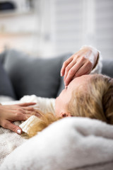 Woman with sinuses problem, stomach, chest and head issues at ho