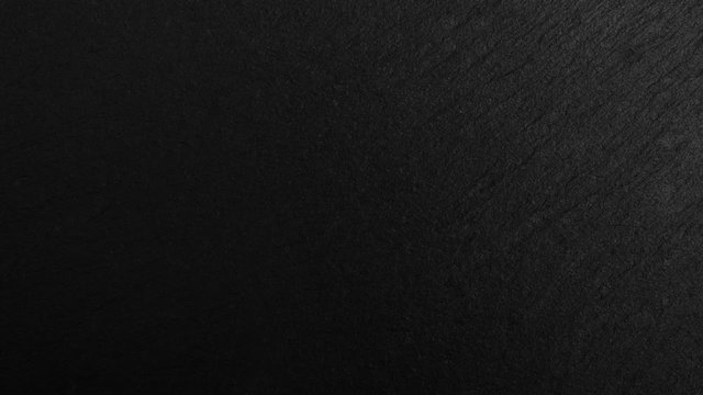 Black sliced stone board textured background, motion graphic