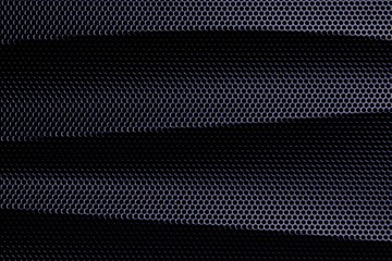 Metal net circle texture background with wavy lines. Dark abstract background for pattern, graphic...