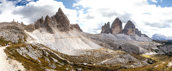Panoramic view to Tre Cime di Lavaredo, also known as Drei Zinnen or Three Peaks of Lavaredo, the most famous point of interest in the Dolomites, a hiking loop around the peaks. Italy, South Tyrol. 