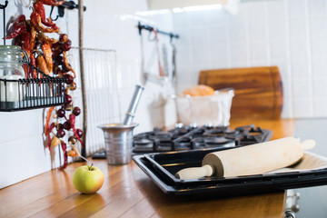Kitchen accessories rolling pin, tray on rustic country