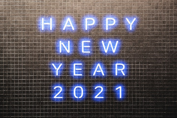 2021 Happy New Year concept with colorful blue neon lights. Design elements for presentations, flyers, cards, leaflets, posters or postcards. Isolated on dark Brown Mosaic Brick Wall background.