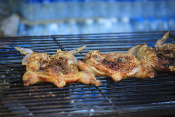 tasty hanging chicken barbecue style in thailand chiang mai market
