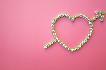  diamond heart with arrow, valentines day, pink background, flat lay