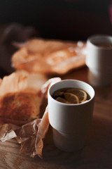 cup of coffee on wooden table