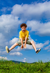 Boy jumping, running outdoor