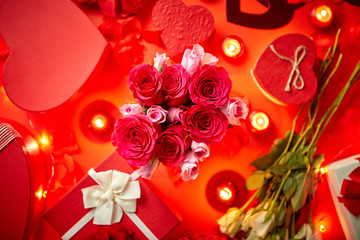 Valentines day romantic decoration with roses, boxed gifts, candles