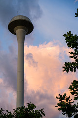 Elevated Water Tank against sunset sky.