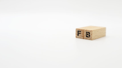 TOKYO, JAPAN. 2020 Jan 5th. Wooden Text Block of FB on Isolated Background