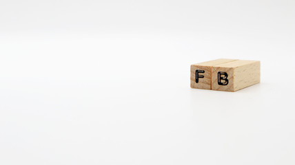 TOKYO, JAPAN. 2020 Jan 5th. Wooden Text Block of FB on Isolated Background