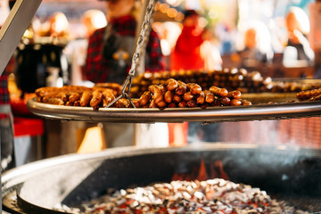 Traditional Delicious German grilled sausages at Christmas market, Germany, December