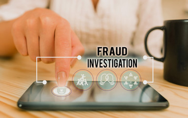 Conceptual hand writing showing Fraud Investigation. Concept meaning process of determining whether...