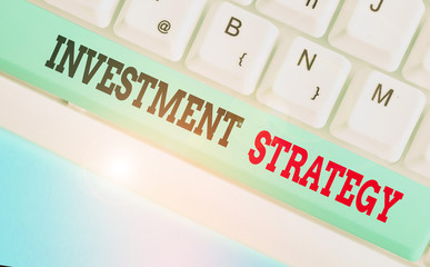 Handwriting text writing Investment Strategy. Conceptual photo the systematic plan to allocate...