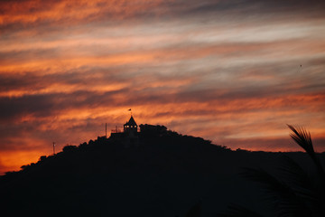 Fototapeta premium Beautiful clouds above the hills during sunset at Wankaner, Gujarat, India
