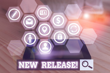 Writing note showing New Release. Business concept for announcing something newsworthy recent product