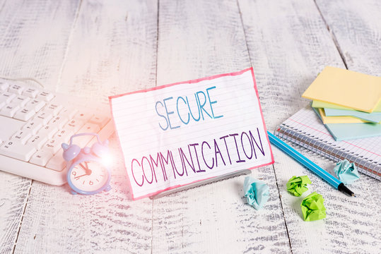 Word writing text Secure Communication. Business photo showcasing preventing unauthorized interceptors from accessing Notepaper stand on buffer wire in between computer keyboard and math sheets