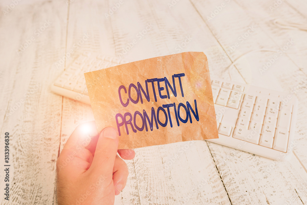Aufkleber writing note showing content promotion. business concept for about getting content in front of the r