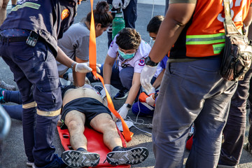 First Aid Emergency CPR, Woman giving CPR to unconscious man has Heart Attack or Shock, While...