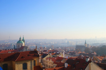 Fototapeta premium Prague tile roofs of old houses, view from above