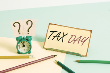 Handwriting text Tax Day. Conceptual photo colloquial term for time on which individual income tax...