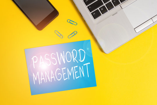 Text sign showing Password Management. Business photo showcasing software used to help users better analysisage passwords Trendy open laptop smartphone small paper sheet clips colored background