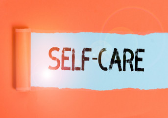 Text sign showing Self Care. Business photo text the practice of taking action to improve one s is...