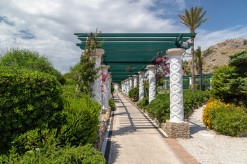 Path with pergola and mosaic pavement at  Kallithea Therms, Kallithea Spring on Rhodes island, Greece