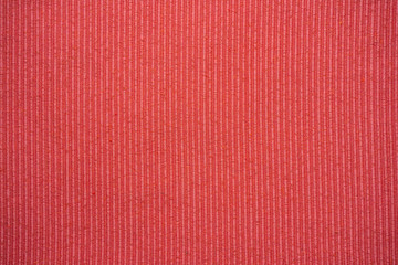 Textured pink fabric background.