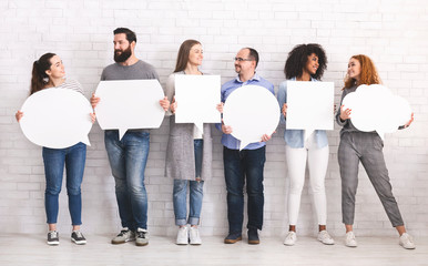 Group of diverse people with white speech bubbles