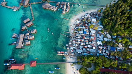 seaside houses in a paradise island in the sea in asia with an small town near the resorts