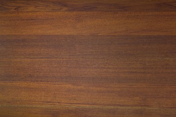 Reddish-brown wood grain for pattern and background.