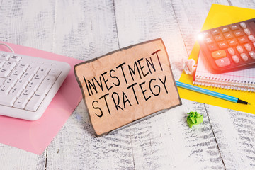 Text sign showing Investment Strategy. Business photo showcasing the systematic plan to allocate...