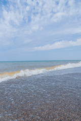 The sea shore at summer Sunny clear day in early summer