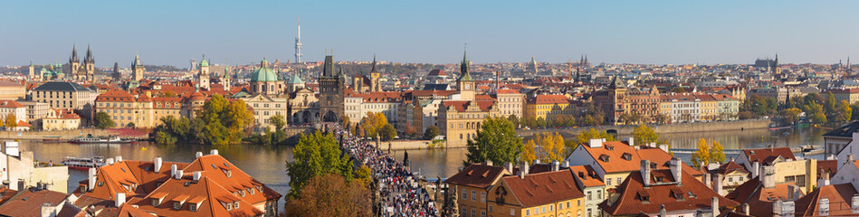 Naklejka na ściany i meble Prague - The panorama of the city with the Charles bridge and the Old Town in evening light.