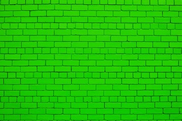 Pure green color painted brick wall.