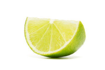 Fresh lime cut sliced isolated on white background with clipping path