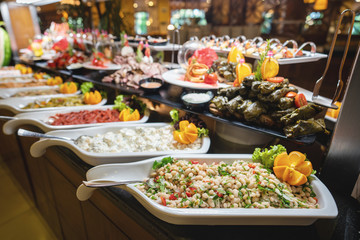 A delicious appetizer and salad buffet with various options in a restaurant or hotel - obrazy, fototapety, plakaty