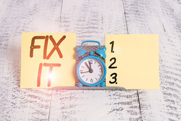 Text sign showing Fix It. Business photo text Fasten something securely in a particular place or...